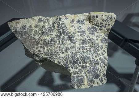 A Sample Of Pyrolusite Ore Extracted, Is A Mineral Basically Composed Of Manganese Dioxide From Lamp