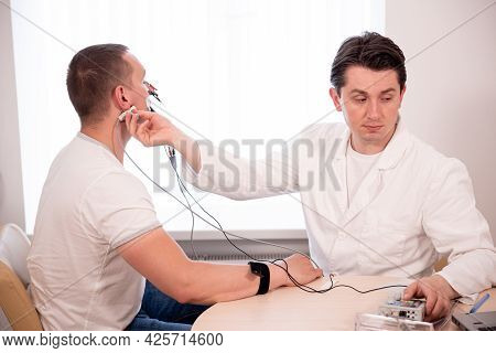 Patient Nerves Testing Using Electromyography At Medical Center