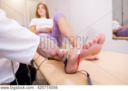 Patient Nerves Testing Using Electromyography At Medical Center