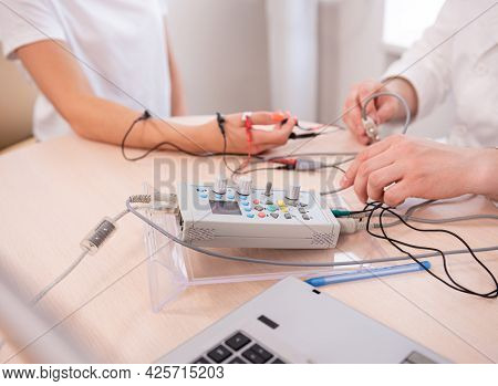 Patient Nerves Testing Using Electromyography At Medical Center