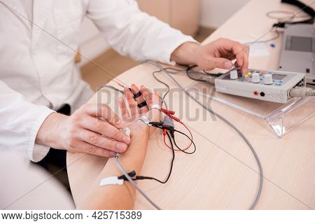 Patient Nerves Testing Using Electromyography At Medical Center