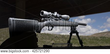 Bolt Action Rimfire Rifle On A Shooting Bench At The Range