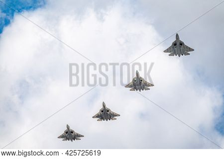 Moscow, Russia - May, 05, 2021: Four Sukhoi Su-57 Felon Flying Over Red Square During The Preparatio