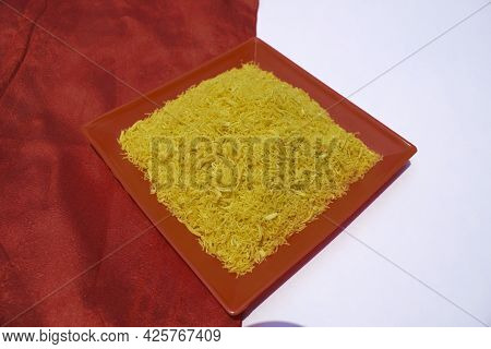 Side View Of Nylon Sev Namkeen Also Known As Jheeni Sev Or Barik Sev, Vermicelli Noodle Fry Served I