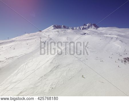 Slope Of Erciyes Mount. Snow Covered Top Of Erciyes Stratovolcano. Aerial View Of Erciyes Ski Resort