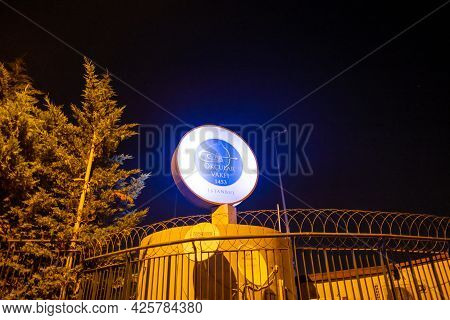 Beyoglu, Istanbul, Turkey - 06.27.2021: Night View Of Logo Of Okcular Vakfi (translation: Organizati