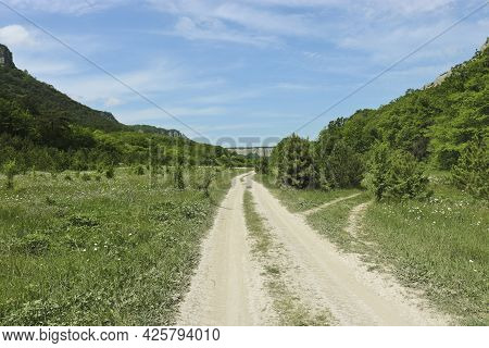 Road Through The High-mountain Plateau To The Karalez Valley, Crimea, Russia. Summer Mountain Landsc
