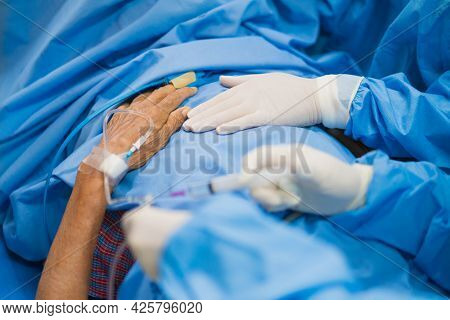 Focus On Hand Giving Normal Saline Solution Or Sodium Chloride After Surgery In Hospital. Patients W