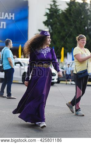 A Series Of Photographs With Ukrainian Costumes. Young Girl, Crimean Tatars In National Clothes. Hol
