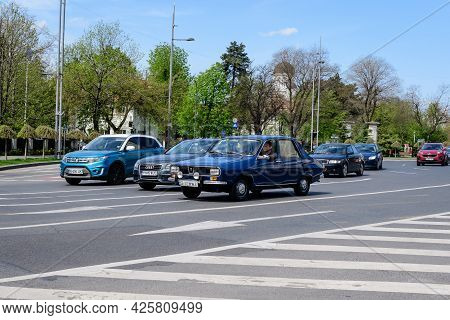 Bucharest, Romania, 24 April 2021 Old Retro Dark Blue Romanian Dacia 1300 Classic Car In Traffic In 