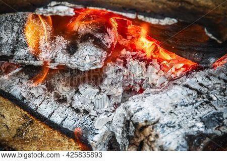Closeup Of Campfire, Burning Wood And Ash