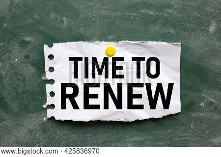Time To Renew. Text On White Paper On Chalkboard