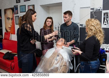 Keune Brand Technologist Artem Raychuk Dyes The Hair Of A Model On Advertising Workshop