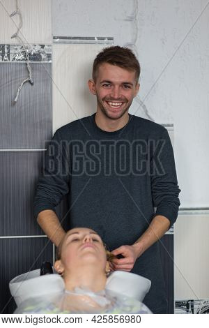 Keune Brand Technologist Artem Raychuk Dyes The Hair Of A Model On Advertising Workshop