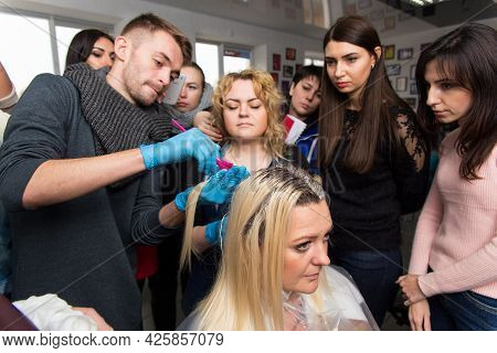 Keune Brand Technologist Artem Raychuk Dyes The Hair Of A Model On Advertising Workshop