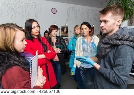 Keune Brand Technologist Artem Raychuk Dyes The Hair Of A Model On Advertising Workshop