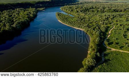 Stunning Top View Of The Sinuous Dniester River. Summer Landscape Of The Dniester River. Picturesque