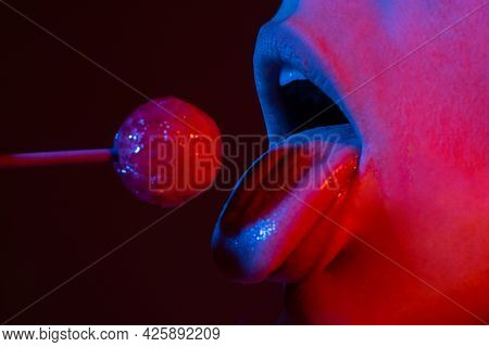 Close Up Lips With Lollipop Isolated, Sexy Blowjob, Sensual Mouth With Lipstick Eats Sweets. Sexy De