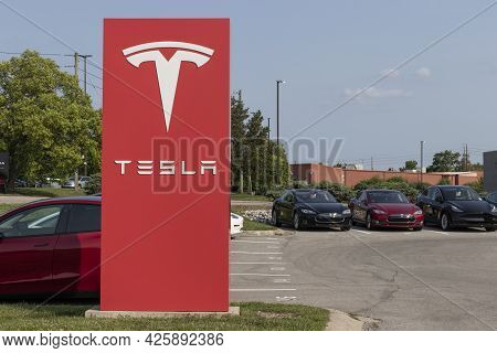 Indianapolis - Circa July 2021: Tesla Electric Vehicles Ev Car And Suv Dealership. Tesla Products In