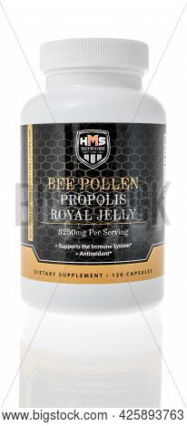 Winneconne, Wi - 13 June 2021:  A Bottle Of Hms Bee Lollen Propolis Royal Jelly Supplement On An Iso
