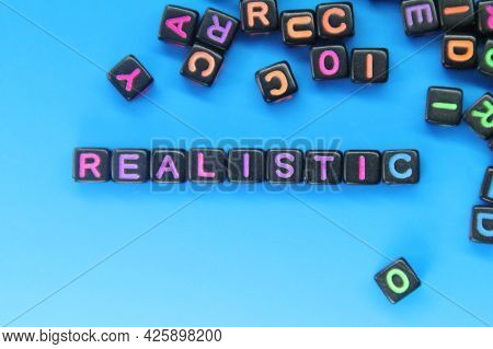 Small Black Cubes With Realistic Colored Writing