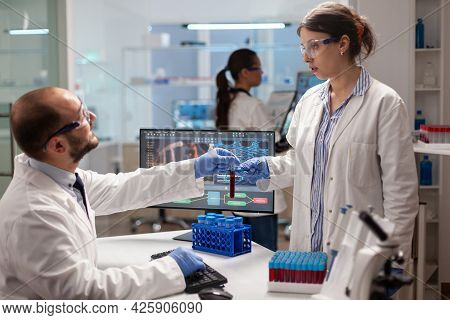 Biochemistry Reserarchers Doing Experiments With Blood Sample For Vaccine Development. Medical Scien