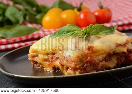 Homemade Delicious Meat Lasagna With Basil Leaf On The Top.  Italian Lasagna With Bachamel Sauce On 