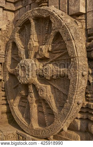 Detail Of Chariot Wheel And Religious Carvings Decorating The Ancient Surya Hindu Temple At Konark O