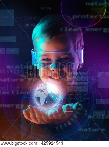 Cute little boy using digital glasses. sci-fi, earth awareness, future mind controlling concept