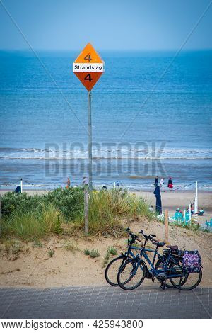 26 June 2021, The Hague, Netherlands, Metal Post With Sign Showing Bathing Area No.4 Or Strandslag, 
