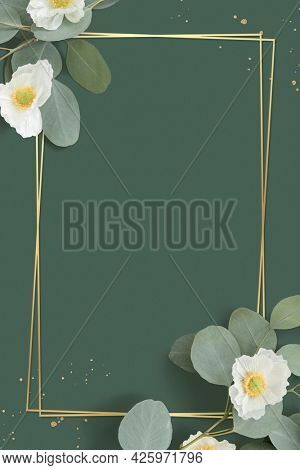Golden floral frame on a green background