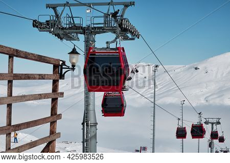 Gondola Type Ropeway On The Slope Of Ski Resort Above Clouds. Erciyes Ski Resort. Kayseri, Turkey