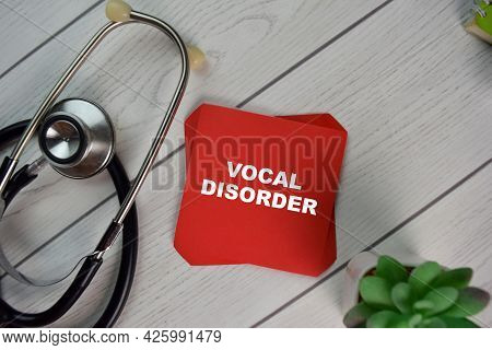 Vocal Disorder Write On Sticky Notes Isolated On Wooden Table.