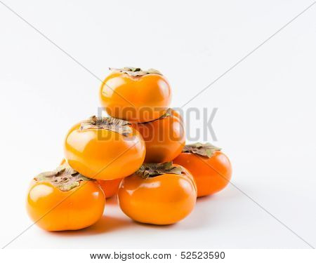 A Small Stack of Fresh Organic Fuyu Persimmon
