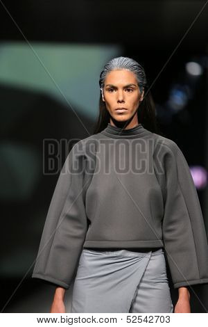 ZAGREB, CROATIA - OCTOBER 17: Fashion model wearing clothes designed by Petra Vuletic and Sasa Hortig on the 'Fashion.hr' show on October 17, 2013 in Zagreb, Croatia.