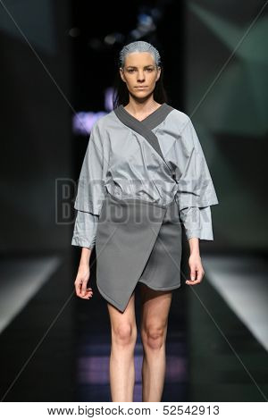 ZAGREB, CROATIA - OCTOBER 17: Fashion model wearing clothes designed by Petra Vuletic and Sasa Hortig on the 'Fashion.hr' show on October 17, 2013 in Zagreb, Croatia.