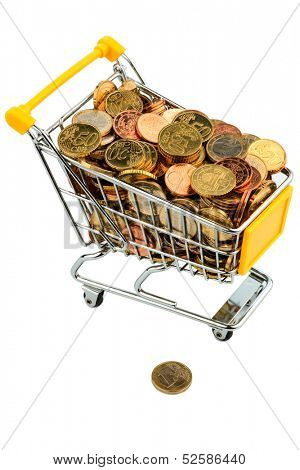 a shopping cart is filled with euro coins. symbolic photo for purchasing power and consumption