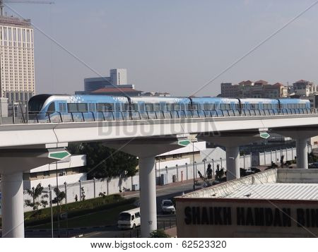 Train approaching Oud Metha Metro Station in Dubai, UAE