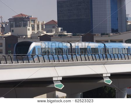 Train approaching Oud Metha Metro Station in Dubai, UAE