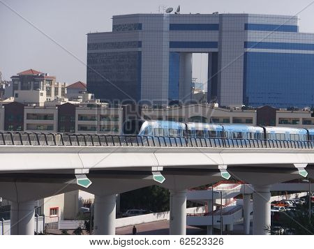 Train approaching Oud Metha Metro Station in Dubai, UAE