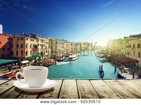coffee on table and Venice in sunset time, Italy