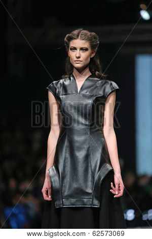 ZAGREB, CROATIA - MARCH 29: Fashion model wearing clothes designed by Branka Donassy on the 'Fashion.hr' show on March 29, 2014 in Zagreb, Croatia