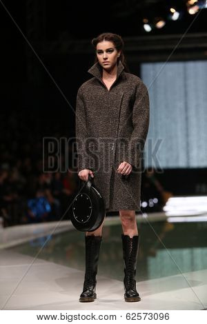 ZAGREB, CROATIA - MARCH 29: Fashion model wearing clothes designed by Branka Donassy on the 'Fashion.hr' show on March 29, 2014 in Zagreb, Croatia