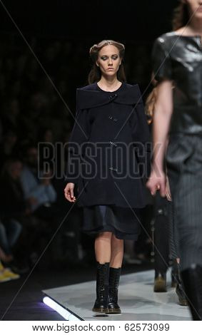ZAGREB, CROATIA - MARCH 29: Fashion model wearing clothes designed by Branka Donassy on the 'Fashion.hr' show on March 29, 2014 in Zagreb, Croatia