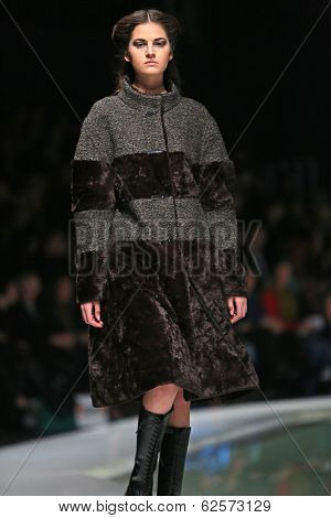 ZAGREB, CROATIA - MARCH 29: Fashion model wearing clothes designed by Branka Donassy on the 'Fashion.hr' show on March 29, 2014 in Zagreb, Croatia