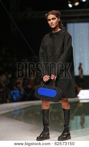 ZAGREB, CROATIA - MARCH 29: Fashion model wearing clothes designed by Branka Donassy on the 'Fashion.hr' show on March 29, 2014 in Zagreb, Croatia