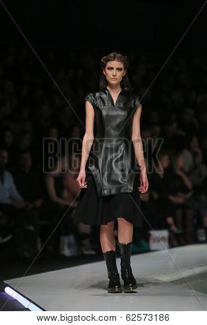 ZAGREB, CROATIA - MARCH 29: Fashion model wearing clothes designed by Branka Donassy on the 'Fashion.hr' show on March 29, 2014 in Zagreb, Croatia