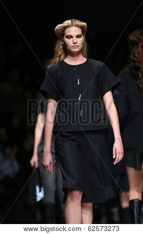 ZAGREB, CROATIA - MARCH 29: Fashion model wearing clothes designed by Branka Donassy on the 'Fashion.hr' show on March 29, 2014 in Zagreb, Croatia