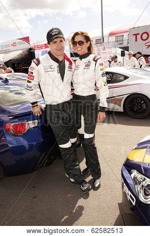 LONG BEACH - APR 1: Sam Witwer, Tricia Helfer at the 37th Annual Toyota Pro/Celebrity Race Practice Day on April 1, 2014 in Long Beach, California