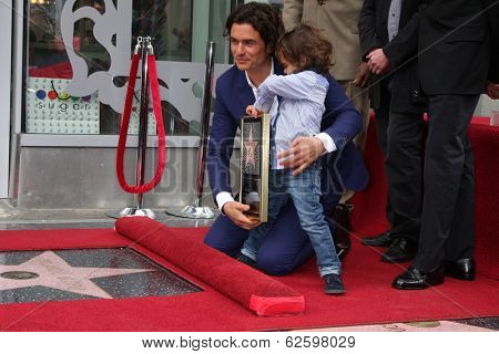 LOS ANGELES - APR 2:  Orlando Bloom, Flynn Bloom at the Orlando Bloom Hollywood Walk of Fame Star Ceremony at TCL Chinese Theater on April 2, 2014 in Los Angeles, CA